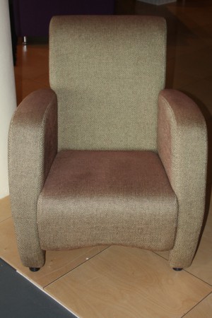 Groene fauteuil € 330,-